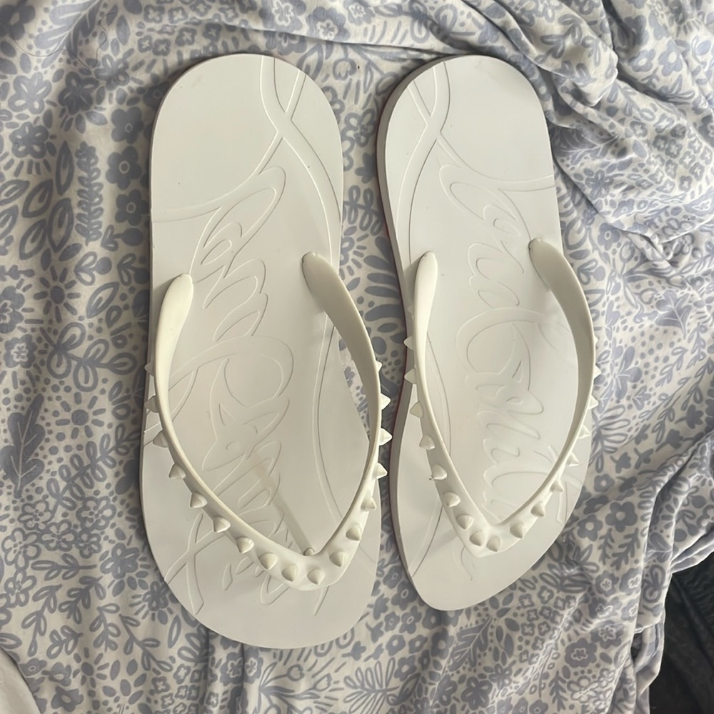 Christian Louboutin
Loubi Donna Spike Red Sole Flip Flops Size 41 Worn Once